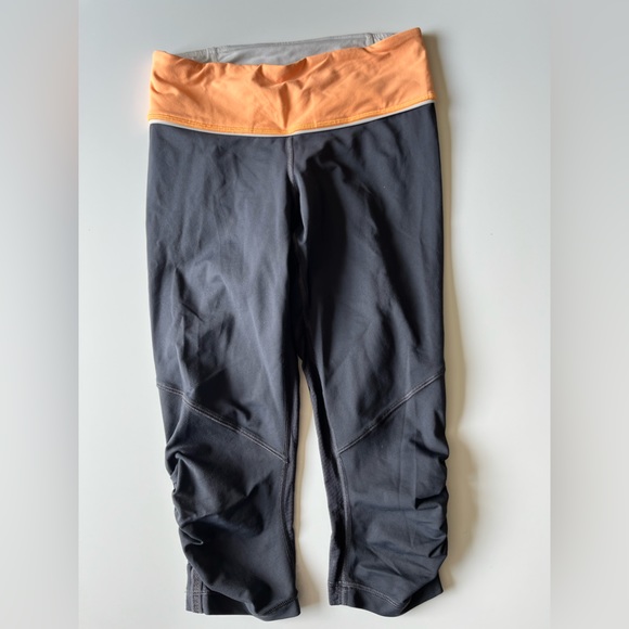 Lululemon Sz 4 Yoga Running Crop Legging Pant Capri black orange Waist - Picture 6 of 9